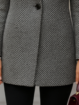 Il cappotto elegante che incarna la classe senza tempo