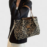 Alizee | Borsa shopping in tela con stampa leopardata