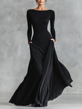 Elegante abito lungo con pieghe fluide 