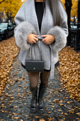 Manica del cappotto di pelliccia