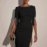 Robe élégante mi-longue à manches fendues ornées de perles