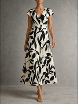Elise | Robe midi élégante à imprimé graphique et coupe flatteuse